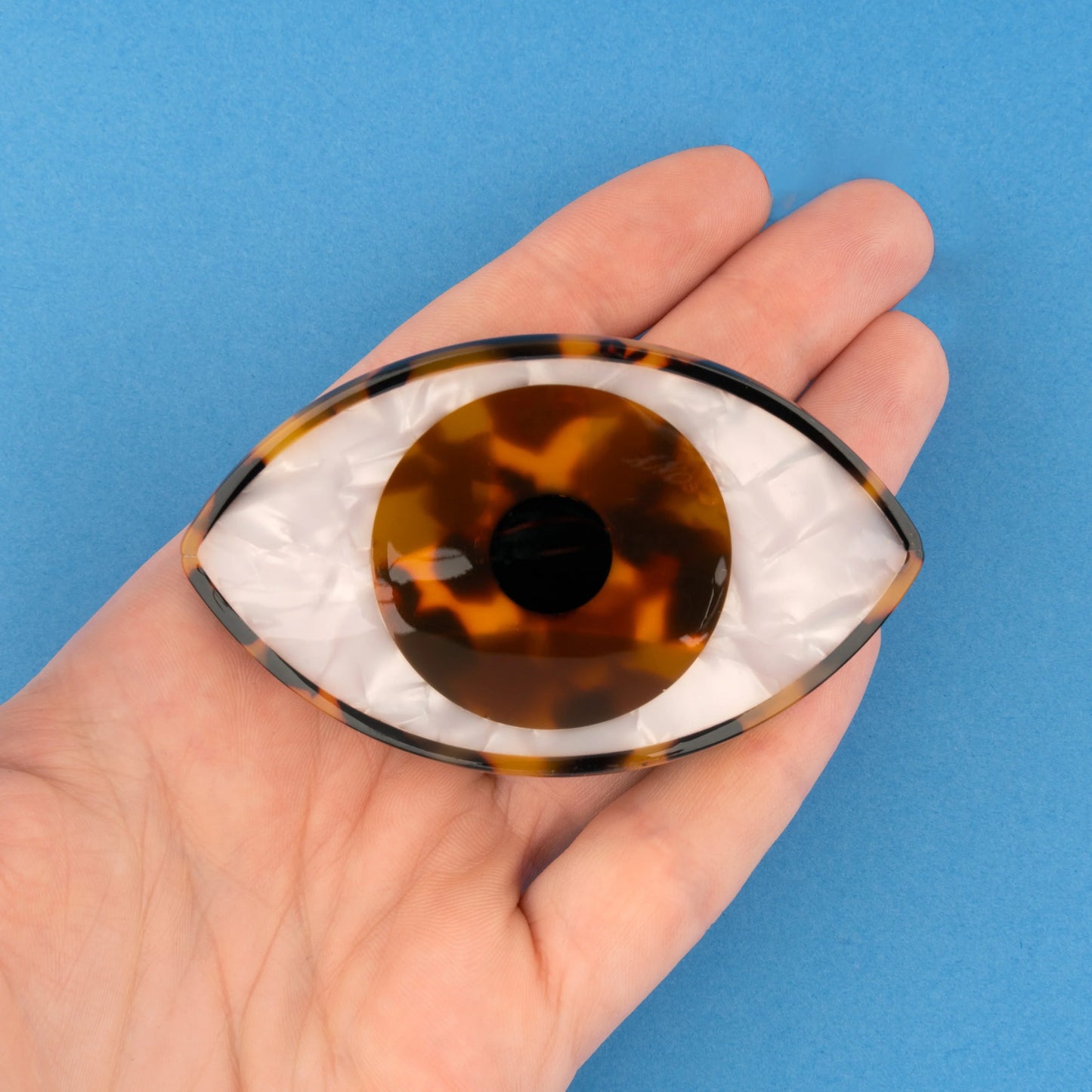 PINCE À CHEVEUX OEIL - MARRON