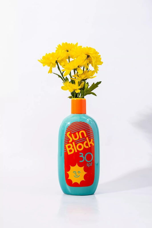 Vase en céramique, crème solaire